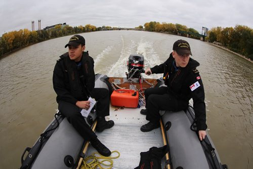 TREVOR HAGAN / WINNIPEG FREE PRESS
Ordinary Seaman, Jude Nabas and Able Seaman, Alex Fawcett, both of the HMCS Chippewa, participating in training exercise where the Red and Assiniboine Rivers, Sunday, October 1, 2017.