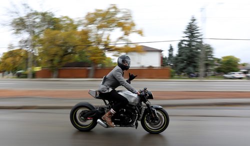 TREVOR HAGAN / WINNIPEG FREE PRESS
Evan Jackson riding his motorcycle during the Gentlemans Ride, a charity motorcycle ride raising money to fight prostate cancer, Sunday, October 1, 2017.