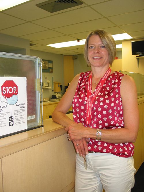Canstar Community News Aug. 14, 2017 - Noreen Shirtliff, Portage District General Hospital's health services director, stands at the reception desk. (ANDREA GEARY/CANSTAR COMMUNITY NEWS)
