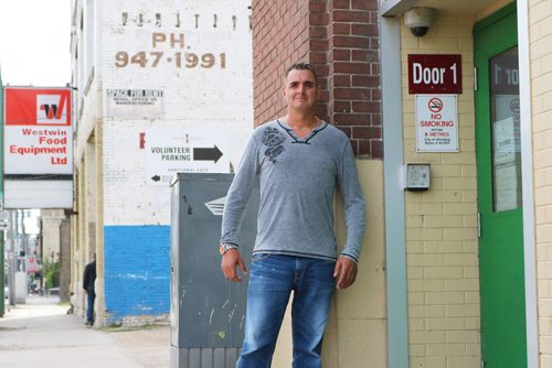 Canstar Community News Sept. 5, 2017 - William Gault stands beside the door that got him out of homelessness and lift him out of poverty. (LIGIA BRAIDOTTI/CANSTAR COMMUNITY NEWS/TIMES)