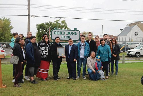 Canstar Community News Sept. 26, 2017 - Gord Dong (middle left) and Point Douglas City Councillor Mike Pagtakhan (middle right) with Dongs family at the Gord Dong Park dedication ceremony. (LIGIA BRAIDOTTI/CANSTAR COMMUNITY NEWS/TIMES)