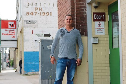 Canstar Community News Sept. 5, 2017 - William Gault stands beside the door that got him out of homelessness and lift him out of poverty. (LIGIA BRAIDOTTI/CANSTAR COMMUNITY NEWS/TIMES)