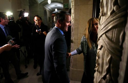 WAYNE GLOWACKI / WINNIPEG FREE PRESS

Finance Minister Cameron Friesen heads back into his office after meeting with reporters regarding the release of the KPMG Fiscal Performance Review report  Tuesday. Larry Kusch  story Oct.3 2017