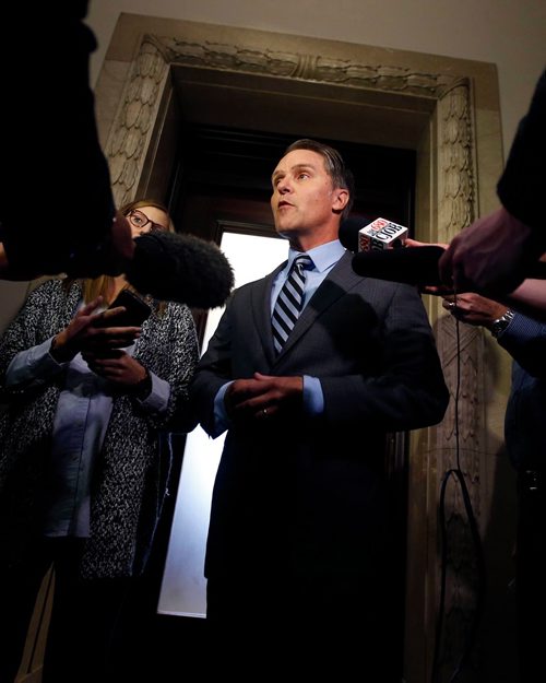 WAYNE GLOWACKI / WINNIPEG FREE PRESS
Finance Minister Cameron Friesen meets with reporters regarding the release of the KPMG Fiscal Performance Review report outside his office in the Manitoba Legislative Building Tuesday. Larry Kusch story Oct.3 2017