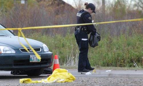 RUTH BONNEVILLE / WINNIPEG FREE PRESS

RCMP Investigators retrieve evidence from the scene of a homicide investigation of a 19-year-old victim (girl) on provincial why 502 in Lac du Bonnet Tuesday.   The girl was found dead from knife wounds in her vehicle that was found on the side of the Hwy  by area residents at about 6:30am Tuesday.  



Oct 03, 2017