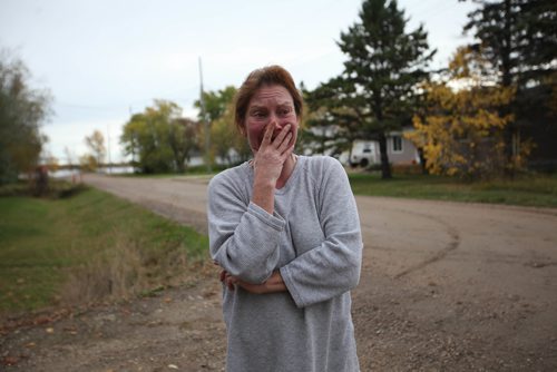 RUTH BONNEVILLE / WINNIPEG FREE PRESS

Holly Szmerski who lives very close to the homicide scene expresses her grief as she describes her reaction to coming across the homicide scene to a reporter Tuesday.   RCMP Investigators were at the scene of a homicide investigation of a 19-year-old victim (girl) on provincial why 502 in Lac du Bonnet Tuesday.   The girl was found dead from knife wounds in her vehicle that was found on the side of the Hwy  by area residents at about 6:30am Tuesday.  



Oct 03, 2017