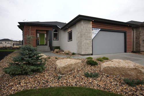 RUTH BONNEVILLE / WINNIPEG FREE PRESS

Homes:  Photos of Hearth Homes show home, bungalow,  at 14 East Plains Drive in Sage Creek. 


Oct 03, 2017