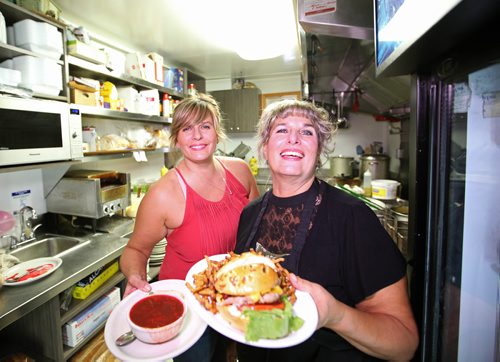 RUTH BONNEVILLE / WINNIPEG FREE PRESS

49.8  Intersection Piece Luda's Deli, 410 Aberdeen Ave (at Salter), Owner Tracy Konopada .
Tracy and her daughter Kristi  are celebrating its Luda's  30th anniversary this year. Various photos of Tracy and her daughter Kristi at the grill, with plates of homemade longtime favourites like perigees and hamburger platter,  famous bowl of borscht (considered the best in the country - people drive straight from the airport for a bowl, before they even go see their parents)  -  shots of the wall memorabilia and exterior shots.    

Dave Sanderson story.


Oct 03, 2017