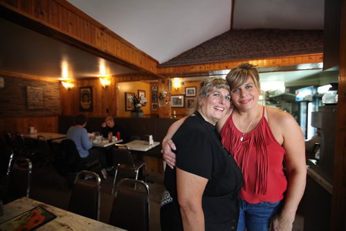 RUTH BONNEVILLE / WINNIPEG FREE PRESS

49.8  Intersection Piece Luda's Deli, 410 Aberdeen Ave (at Salter), Owner Tracy Konopada .
Tracy and her daughter Kristi  are celebrating its Luda's  30th anniversary this year. Various photos of Tracy and her daughter Kristi at the grill, with plates of homemade longtime favourites like perigees and hamburger platter,  famous bowl of borscht (considered the best in the country - people drive straight from the airport for a bowl, before they even go see their parents)  -  shots of the wall memorabilia and exterior shots.    

Dave Sanderson story.


Oct 03, 2017
