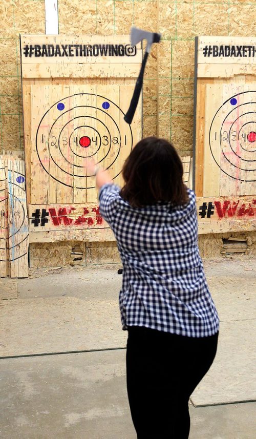 BORIS MINKEVICH / WINNIPEG FREE PRESS
Jen Zoratti tries throwing an axe! In advance of the World Championship play downs with will be happening Oct. 9th and 10th. Photo taken at Bad Axe Throwing, 1393 Border Street Unit #6. Oct 4, 2017