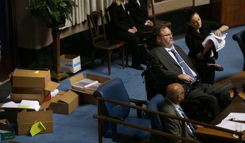 WAYNE GLOWACKI / WINNIPEG FREE PRESS

MLA Steven Fletcher took centre stage with a Manitoba legislature filibuster Wednesday citing matters of Parliamentary privilege. His aide is holding documents for him, with plenty more information in boxes at left. Larry Kusch /Nick Martin story Oct.4 2017
