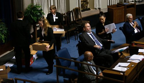 WAYNE GLOWACKI / WINNIPEG FREE PRESS

MLA Steven Fletcher took centre stage with a Manitoba legislature filibuster Wednesday citing matters of Parliamentary privilege. His aide is holding documents for him,  as Pages carry some of his  boxes of information at left. Larry Kusch /Nick Martin story Oct.4 2017
