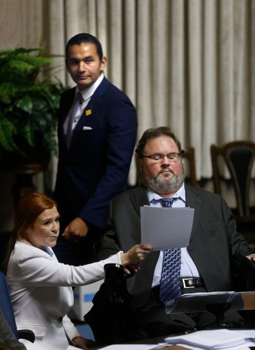 WAYNE GLOWACKI / WINNIPEG FREE PRESS
MLA Steven Fletcher took centre stage with a Manitoba legislature filibuster Wednesday citing matters of Parliamentary privilege. In back Wab Kinew pass by on his first day as the NDP leader in the Manitoba Legislature. Larry Kusch /Nick Martin story Oct.4 2017
