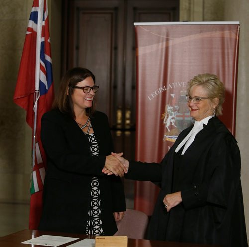 WAYNE GLOWACKI / WINNIPEG FREE PRESS

At left, Justice Minister Heather Stefanson and Speaker of the Legislative Assembly Myrna Driedger shake hands after signing the agreement on changes in The Legislative Security Act. The event was held in the Manitoba Legislative building Thursday.   Nick Martin Larry Kusch story Oct.5 2017