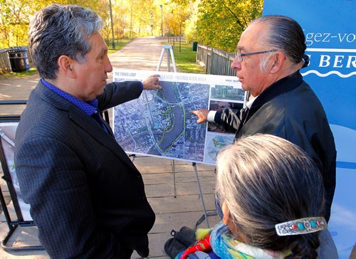 BORIS MINKEVICH / WINNIPEG FREE PRESS
Plans for The Forks South Point Enhancement Project are moving forward and work is set to begin to improve the safety and accessibility of the existing pathway, incorporating Indigenous cultural interpretation to recognize the unique history of this space. From left, Member of Parliament for Saint BonifaceSaint Vital Dan Vandal, Clarence Nepinak and Barb Nepinak (back facing) at the event held on the walking bridge at The Forks.  BILL REDEKOP STORY. OCT. 6, 2017