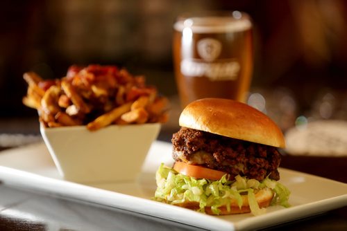 TREVOR HAGAN / WINNIPEG FREE PRESS
Bacon Poutine and the Winnipegger Burger at the Tipsy Cow, restaurant review, Friday, October 6, 2017.