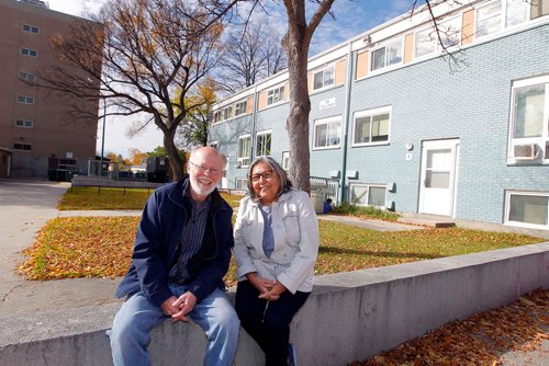 BORIS MINKEVICH / WINNIPEG FREE PRESS
From left, Jim Silver, a U of W prof, and Linda Smith, an instructor at a local literacy program pose for a photo in the Charles Walk housing complex. For Sanders story running Tuesday on a documentary film on how a public housing slum transforming into a healthy, thriving community. They were at  premiere of A Good Place to Live: Transforming Public Housing in Lord Selkirk Park on Friday night with Jim Silver, a U of W prof whose also in the film and is a member of the Manitoba Research Alliance that funded the film. CAROL SANDERS STORY. OCT. 7, 2017