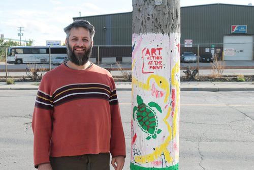 Canstar Community News Oct. 3, 2017 - Edward Cloud stands beside a hydro pole he helped artists paint as a project he spearheaded in North Point Douglas. (LIGIA BRAIDOTTI/CANSTAR COMMUNITY NEWS/TIMES)