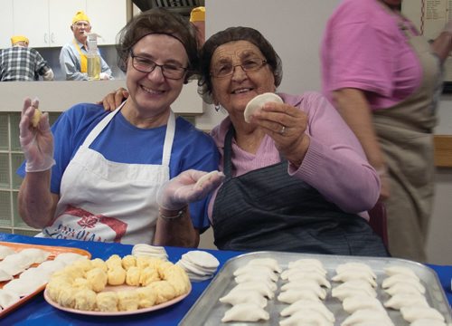 Canstar Community News Emily Hawrysh (left) and Jean Rotinsky pinch perogies every week at Holy Eucharist Church. (SHELDON BIRNIE/CANSTAR/THE HERALD)