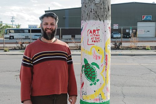 Canstar Community News Oct. 3, 2017 - Edward Cloud stands beside a hydro pole he helped artists paint as a project he spearheaded in North Point Douglas. (LIGIA BRAIDOTTI/CANSTAR COMMUNITY NEWS/TIMES)