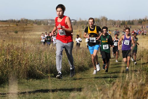 RUTH BONNEVILLE / WINNIPEG FREE PRESS

STDUP FOR SPORTS FRONT...

Varsity Boys Team and Open make their way up one of several hills during the  - 5000 m Provincial Cross Country Championships race at Kilcona Park Wednesday afternoon.  

Provincial Cross Country Championships
Kilcona Park, October 11, 2017


Oct 11, 2017