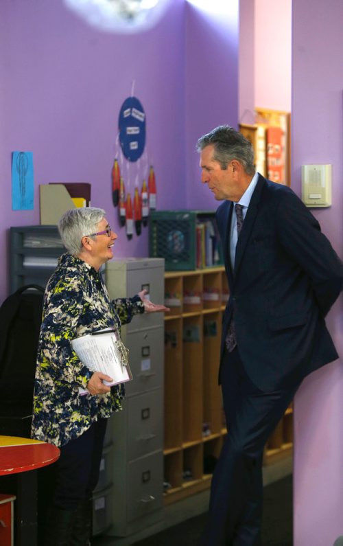 WAYNE GLOWACKI / WINNIPEG FREE PRESS

 Premier Brian Pallister speaks with Dilly Knol, Executive Director,  Andrews Street Family Centre prior to the Child and Family Services reform announcement held at the Andrews Street Family Centre Thursday. Nick Martin story Oct.12 2017