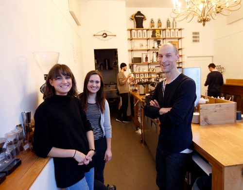 WAYNE GLOWACKI / WINNIPEG FREE PRESS.  

49.8  From right, Nils Vik, owner of Parlour Coffee with baristas Tanisha Wall and Maren Tait with Colton Rempel in back. All the employees get health and dental benefits, as well as raises and gifts for years of service. Vik makes a point of saying he works with people, they don't work for him. Jessica Botelho-Urbanski story Oct.12 2017