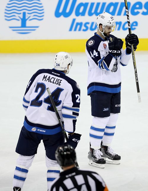 TREVOR HAGAN / WINNIPEG FREE PRESS
Manitoba Moose, Cam Maclise (24) and Julian Melchiori (44) celebrate after Melchiori scored against the Cleveland Monsters, Friday, October 13, 2017.