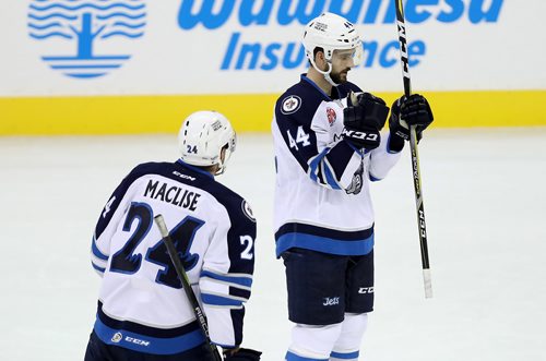 TREVOR HAGAN / WINNIPEG FREE PRESS
Manitoba Moose, Cam Maclise (24) and Julian Melchiori (44) celebrate after Melchiori scored against the Cleveland Monsters, Friday, October 13, 2017.