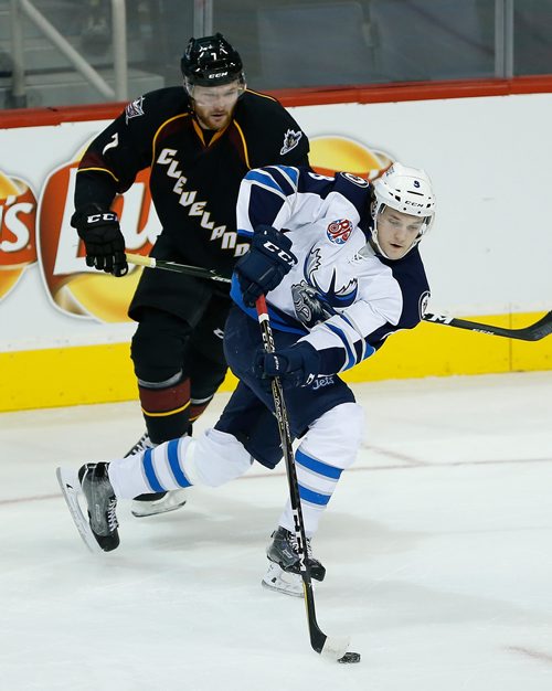 JOHN WOODS / WINNIPEG FREE PRESS
Manitoba Moose Sami Niku (8) gets past Cleveland Monsters' Nick Moutrey (7) during second period AHL action in Winnipeg on Sunday, October 15, 2017.