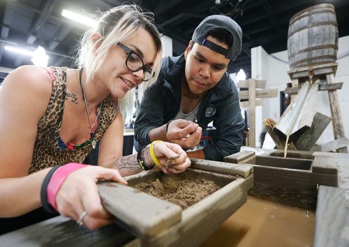 JOHN WOODS / WINNIPEG FREE PRESS
Elaine Brown and Renny Monias pan for rocks, fossils and minerals at a sluice set up by Jacobs Trading Ye Olde Rock Shop at the Winnipeg Rock and Mineral Show at Assiniboia Downs Sunday, October 15, 2017.