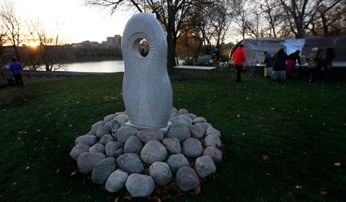 WAYNE GLOWACKI / WINNIPEG FREE PRESS

A Sunrise Ceremony was held Monday morning by the monument in honour of Manitobas Missing and Murdered Indigenous Women and Girls at The Forks for the Missing and Murdered Indigenous Women and Girls hearings that begin in Winnipeg.¤  Oct.16 2017