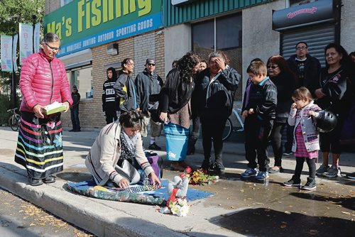 Canstar Community News Oct. 11, 2017 - Community members pay homage to 23-year-old Cody Severight who died victmim of a hit and run in the evening of Oct. 10. (LIGIA BRAIDOTTI/CANSTAR COMMUNITY NEWS/TIMES)