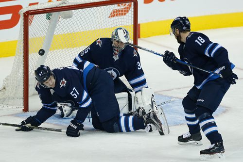 JOHN WOODS / WINNIPEG FREE PRESS
Winnipeg Jets' Tyler Myers (57) blocks the shot from  in front of goaltender Steve Mason (35) as Bryan Little (18) defends during first period NHL action against the Columbus Blue Jackets in Winnipeg on Tuesday, October 17, 2017.
