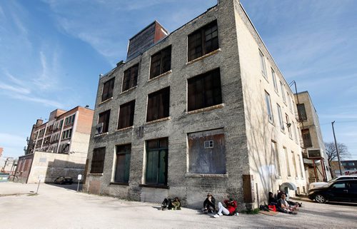 PHIL HOSSACK / WINNIPEG FREE PRESS  -  Homeless gather behind a Princess street building at Siloam Misson Friday. See story. - Oct 20, 2017