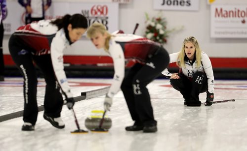 TREVOR HAGAN / WINNIPEG FREE PRESS
Jennifer Jones watches her shot as Jill Officer and Dawn McEwen sweep, while playing against the Englot rink at the curling club in Portage la Prairie, Sunday, October 22, 2017.