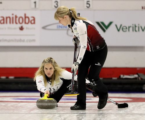 TREVOR HAGAN / WINNIPEG FREE PRESS
Jennifer Jones throws her shot as Dawn McEwen gets ready to sweep, while playing against the Englot rink at the curling club in Portage la Prairie, Sunday, October 22, 2017.