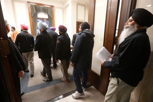 JOHN WOODS / WINNIPEG FREE PRESS
People lineup to sign in to speak at the hearing of Bill 30 - The Local Drivers for Hire Act in Winnipeg Monday, October 23, 2017.