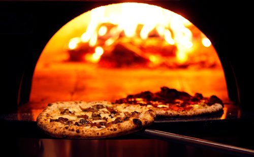PHIL HOSSACK / WINNIPEG FREE PRESS  - HARTH - One of Harth's Neapolitan Style Pizza's emerges from the wood fired oven.  - Oct 23, 2017