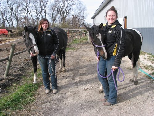 Canstar Community News Oct. 22, 2017 - (From left) Free Rein Horsemanship owner Alyssa Van Wyck, holding her paint mare Tia, and sister Rachael Van Wyck, holding Chief, are shown at the stable in Headingley. (ANDREA GEARY/CANSTAR COMMUNITY NEWS)