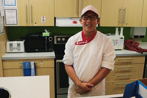 Canstar Community News Oct. 18, 2017 - Tiger Pengilinan, Grade 12 student involved with the Seven Oaks Met School breakfast program stands by the kitchen where he cooks every week for his school mates. (LIGIA BRAIDOTTI/CANSTAR COMMUNITY NEWS/TIMES)