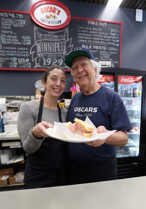JASON HALSTEAD / WINNIPEG FREE PRESS

Larry Brown, owner of Oscar's Deli, and his daughter Rachel show off a corned beef sandwich at the Hargrave Street deli on Oct. 24, 2017.
(Re: INTERSECTION - old restos)
