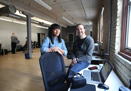 RUTH BONNEVILLE / WINNIPEG FREE PRESS

49.8 Feature
WORKPLACE #5 - Campfire Union 
This up-and-coming virtual reality design company is keeping workplace culture top of mind by prioritizing social time among co-workers. Rachel Hosein(left), John Luxford and the rest of the Campfire Union staff at office on  McDermot Ave.

 See Jessica's story. 

Oct 24,, 2017