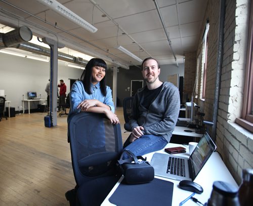 RUTH BONNEVILLE / WINNIPEG FREE PRESS

49.8 Feature
WORKPLACE #5 - Campfire Union 
This up-and-coming virtual reality design company is keeping workplace culture top of mind by prioritizing social time among co-workers. Rachel Hosein(left), John Luxford and the rest of the Campfire Union staff at office on  McDermot Ave.

 See Jessica's story. 

Oct 24,, 2017