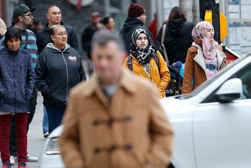 JOHN WOODS / WINNIPEG FREE PRESS
Some of Winnipeg's diverse population walking on Portage Avenue Wednesday, October 25, 2017.