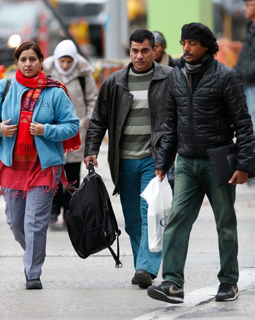 JOHN WOODS / WINNIPEG FREE PRESS
Some of Winnipeg's diverse population walking on Portage Avenue Wednesday, October 25, 2017.