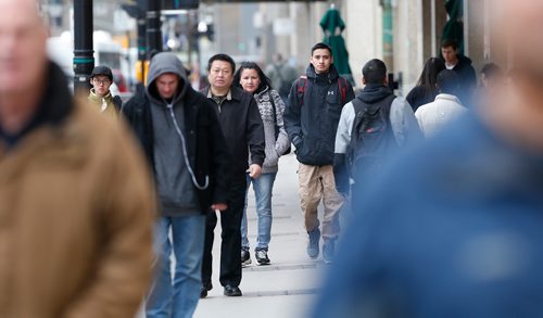 JOHN WOODS / WINNIPEG FREE PRESS
Some of Winnipeg's diverse population walking on Portage Avenue Wednesday, October 25, 2017.