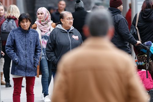 JOHN WOODS / WINNIPEG FREE PRESS
Some of Winnipeg's diverse population walking on Portage Avenue Wednesday, October 25, 2017.