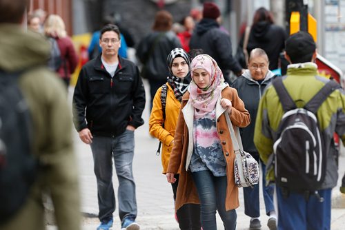 JOHN WOODS / WINNIPEG FREE PRESS
Some of Winnipeg's diverse population walking on Portage Avenue Wednesday, October 25, 2017.