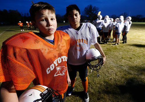 JOHN WOODS / WINNIPEG FREE PRESS
Gage Richey (L) and John Toledo of the Sunrise Coyotes are photographed during practice in Oakbank Wednesday, October 25, 2017. The Coyotes are playing in Football Manitoba's championship weekend.
